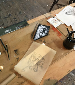 Angela entwirft ihr Puzzle